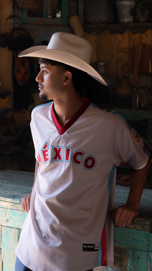 Free Young man in cowboy hat and Mexico jersey in León, Mexico. Stock Photo