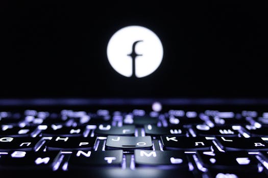 Close-up of a glowing keyboard with a symbol, creating a tech-focused ambiance.