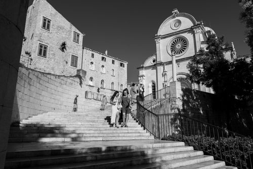 Free Monochrome capture of people descending steps near Šibenik cathedral, Croatia. Stock Photo
