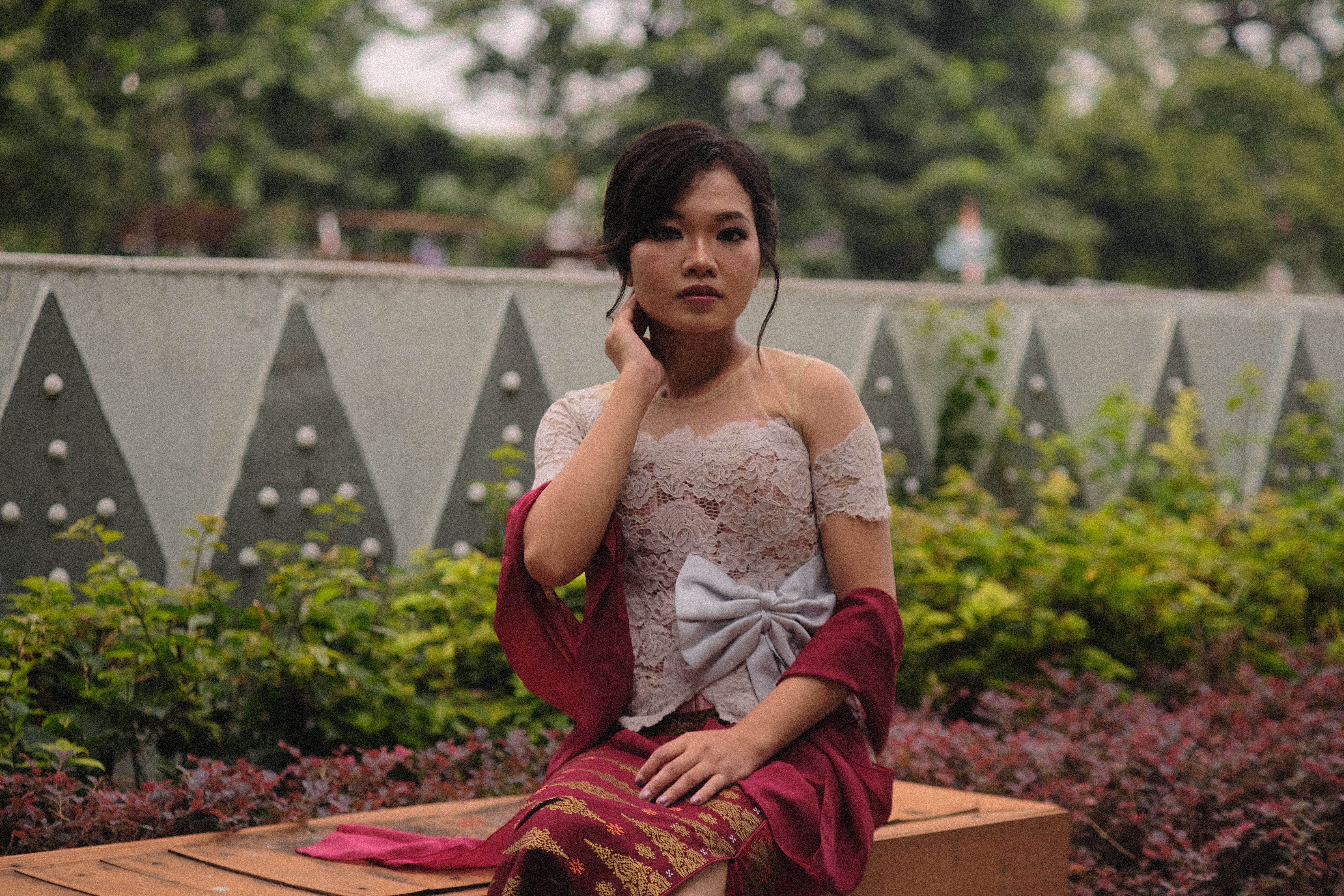 Elegant Woman in Traditional Dress Outdoors