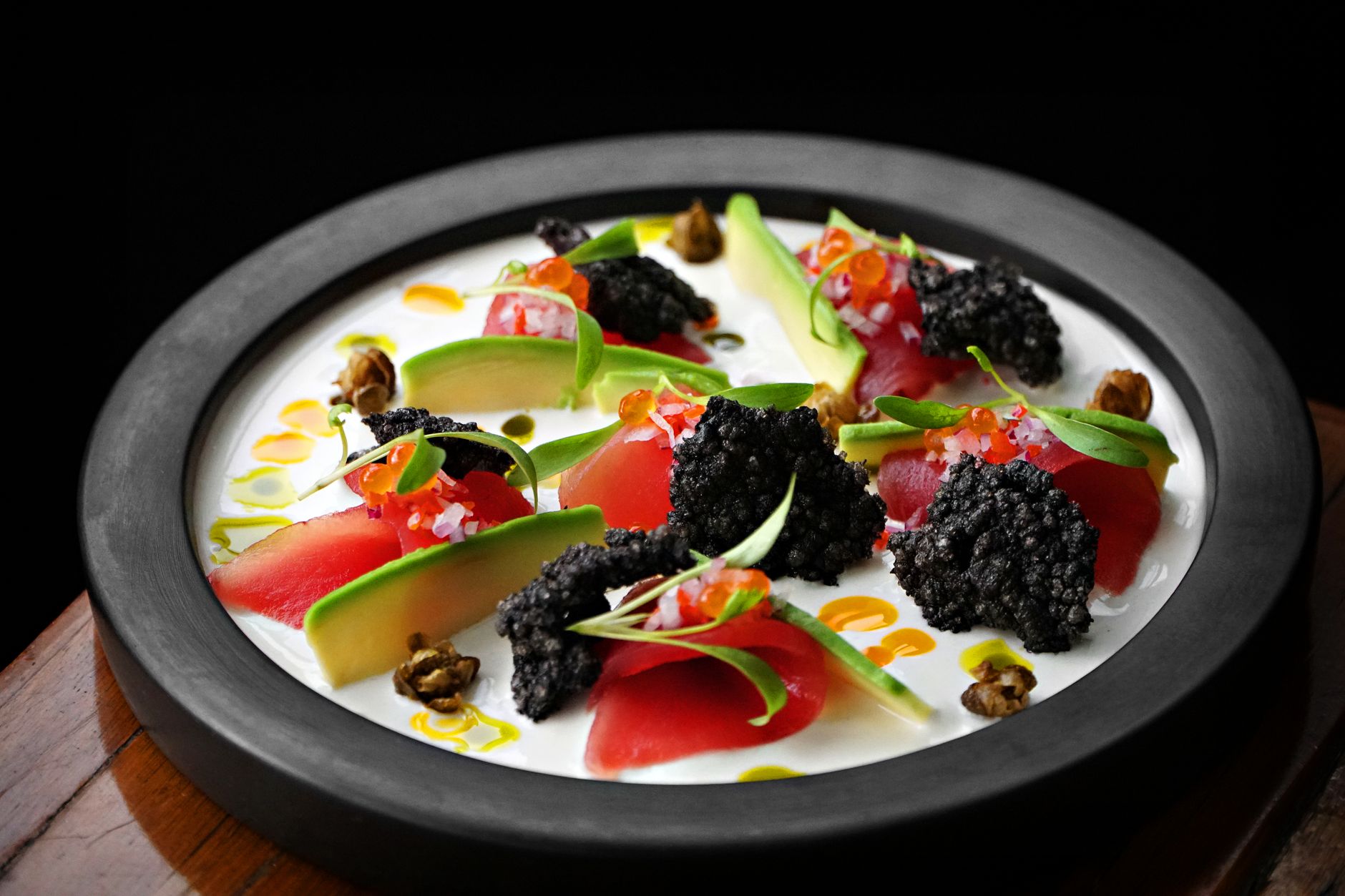 Smoked cashew romesco sauce served in a white bowl