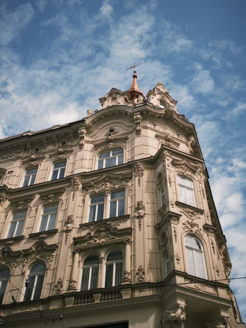 Free Elegant ornate architecture against a bright blue sky, showcasing historic design. Stock Photo