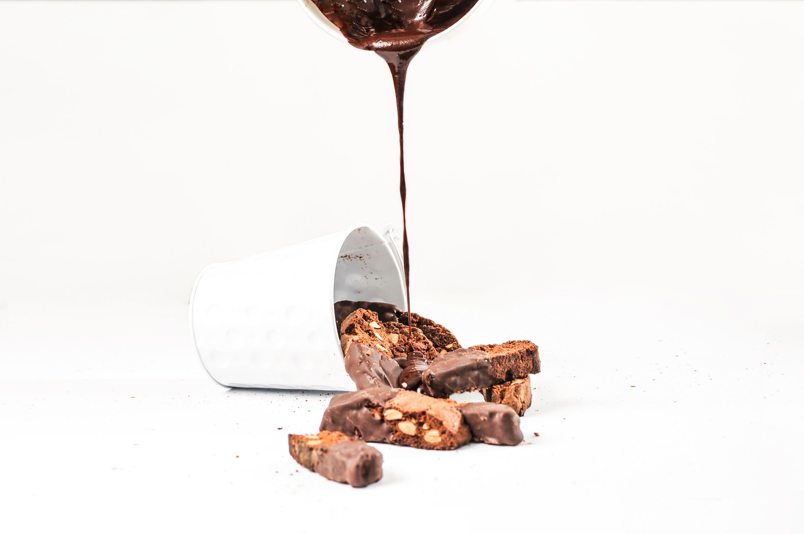 Melted chocolate being tempered on a marble slab