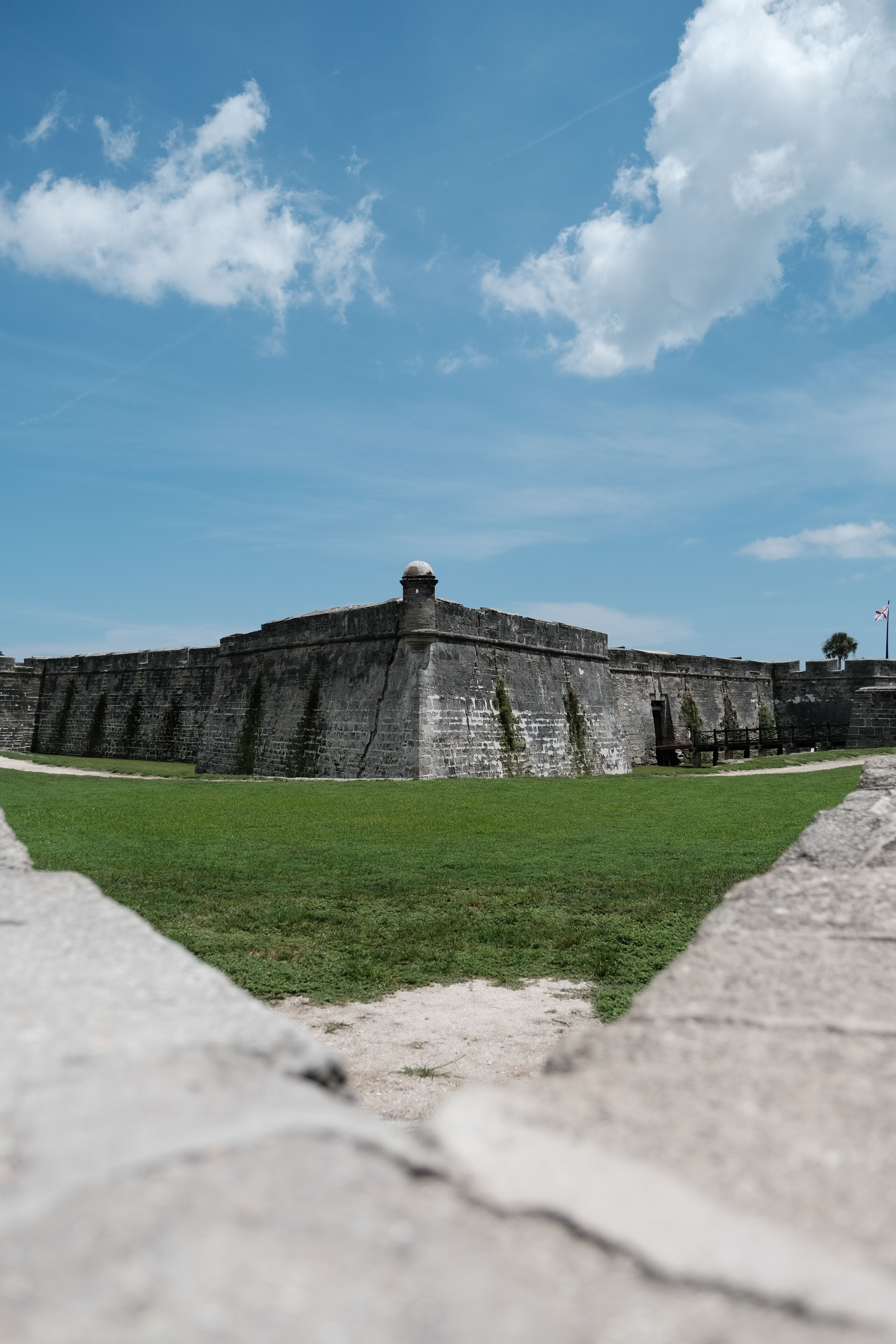 Historic Stone Fort Under Clear Blue Sky · Free Stock Photo
