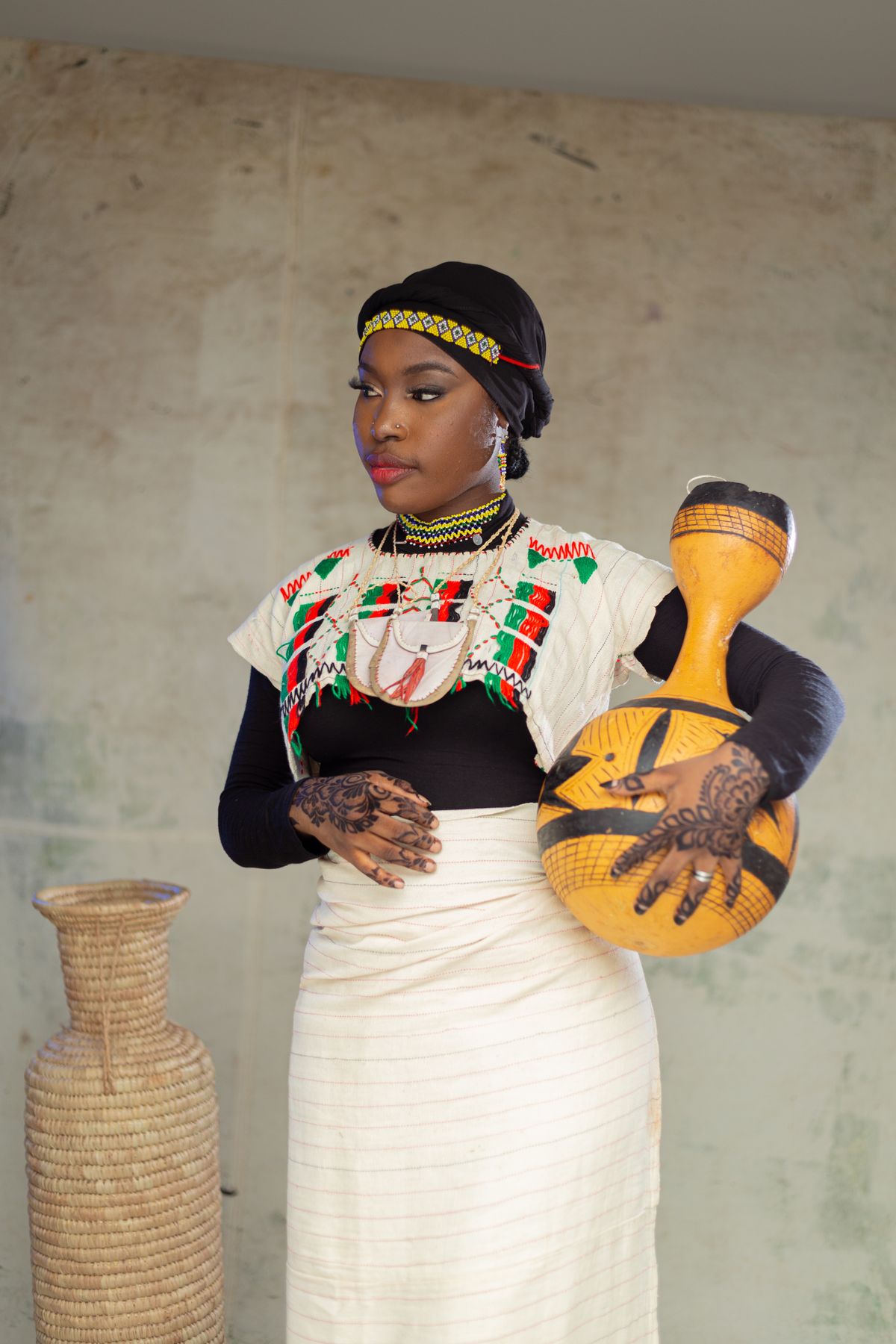Woman Posing in Traditional Clothing and with Bowl · Free Stock Photo