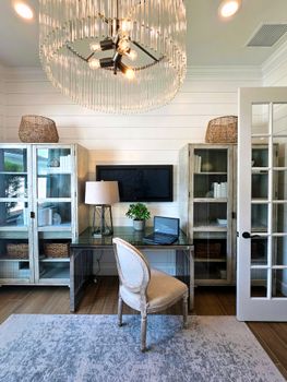 Bright and modern home office setup with chic decor and minimalistic design.