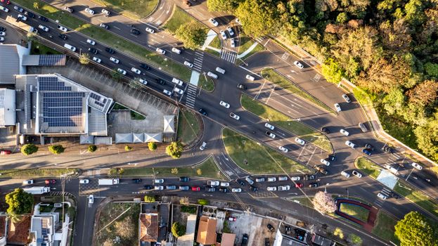 High-angle aerial shot of a busy traffic intersection in Londrina, Brazil.