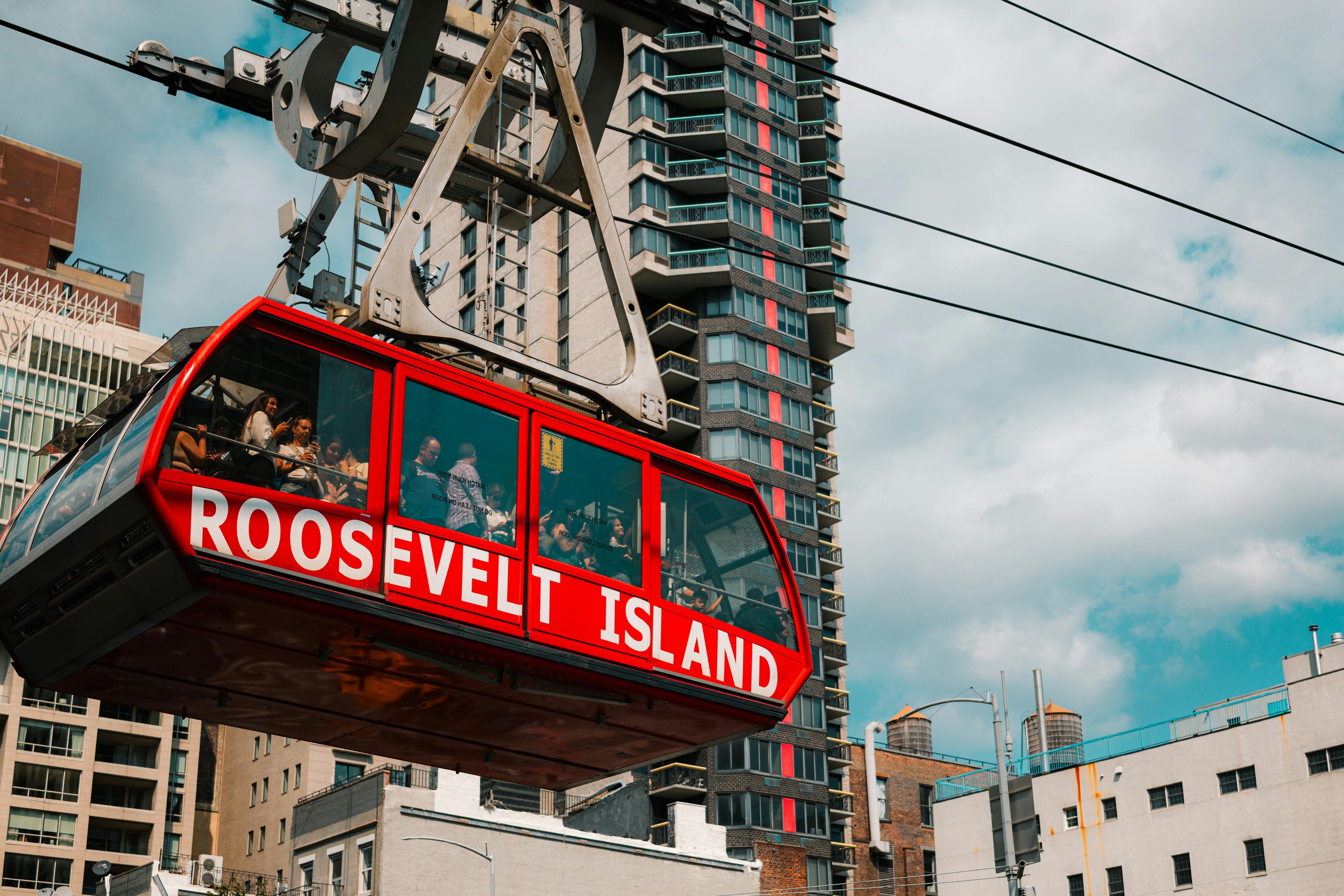 Roosevelt Island Tramway with city skyline in New York, capturing vibrant urban life.