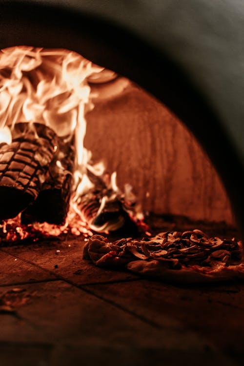 Free Photo of Pizza in Furnace Stock Photo