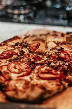 Delicious close-up of a freshly baked, mouthwatering Italian pizza with toppings.