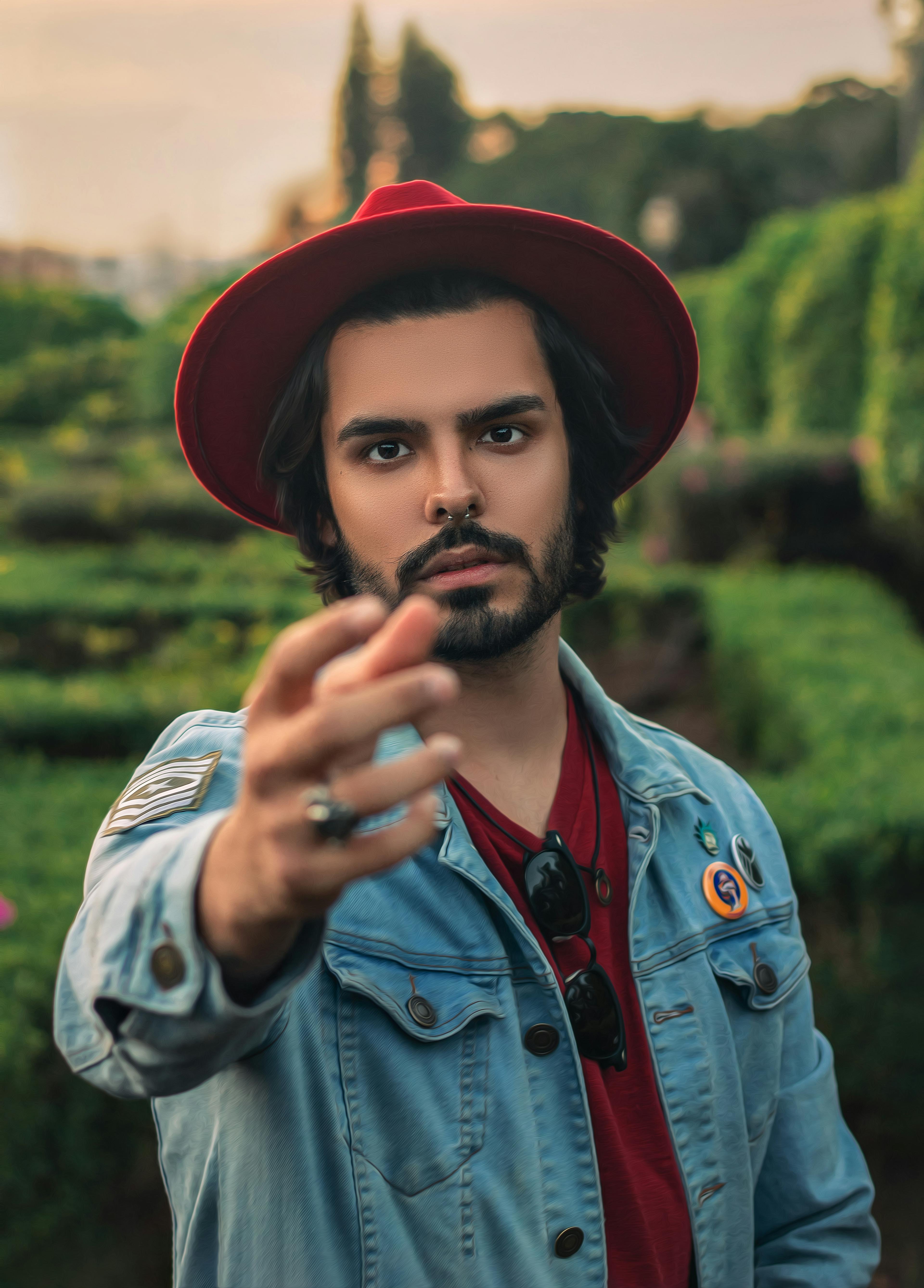 Selective Focus Photography of Man Wearing Denim Jacket