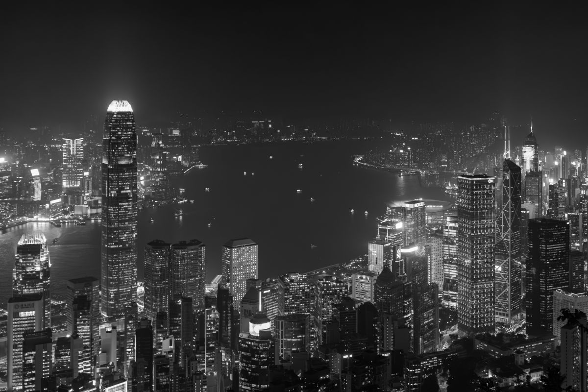 Hong Kong skyline at night in black and white — the moody cinematic city of Leslie Cheung's films