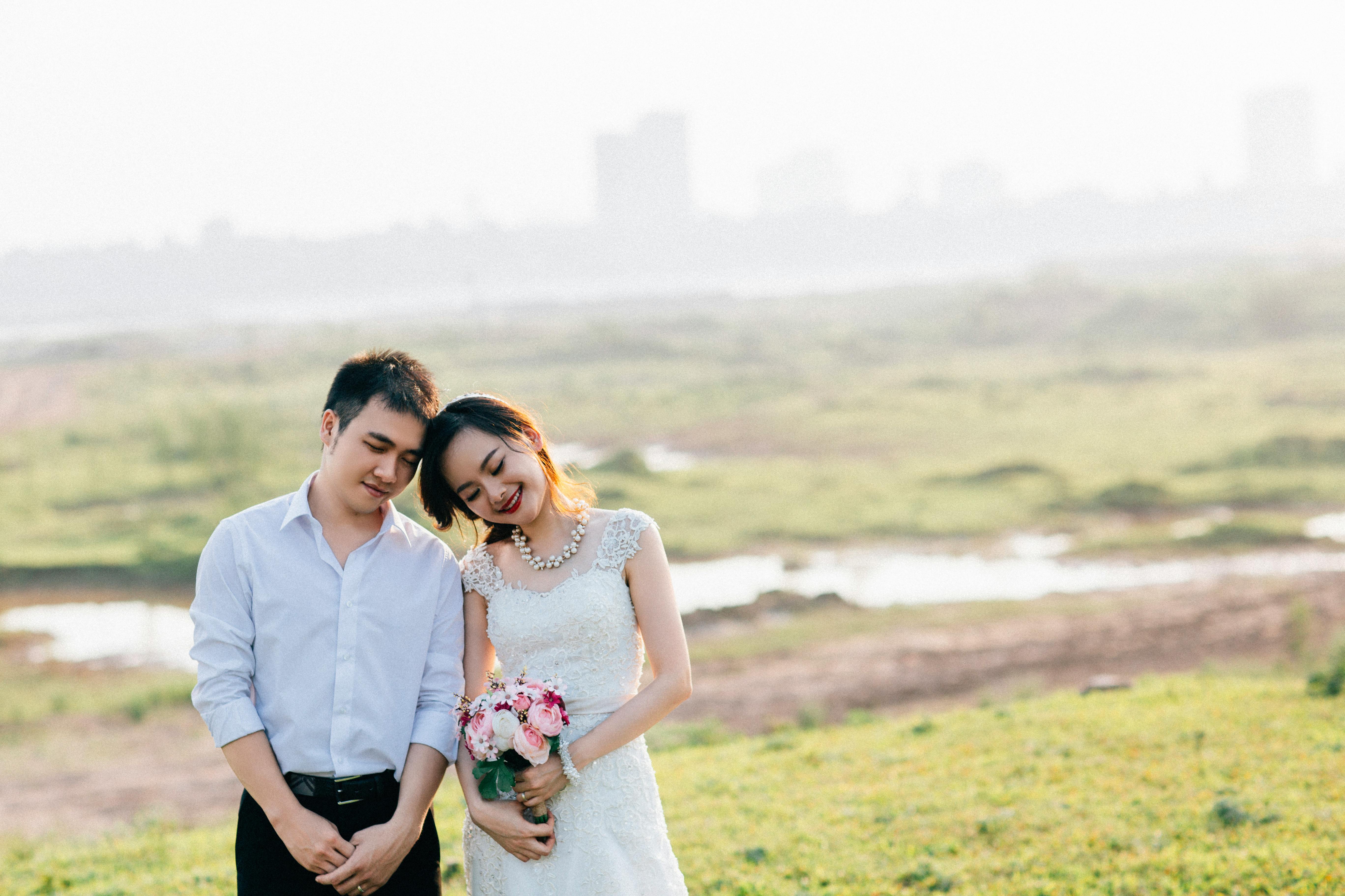 A joyful couple celebrating their wedding outdoors