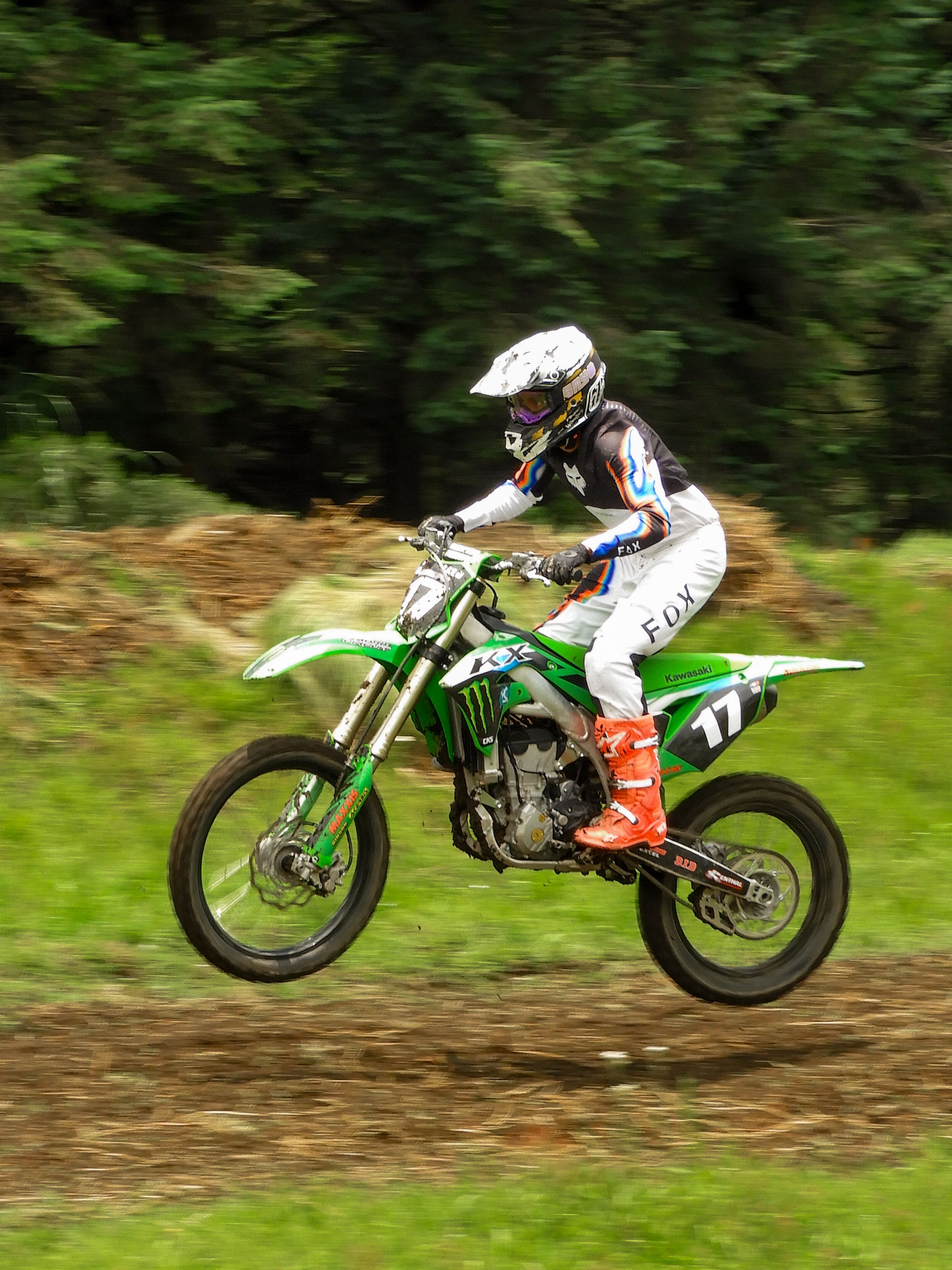 Energetic motocross race in La Marquesa, showcasing high-speed action and vibrant gear.