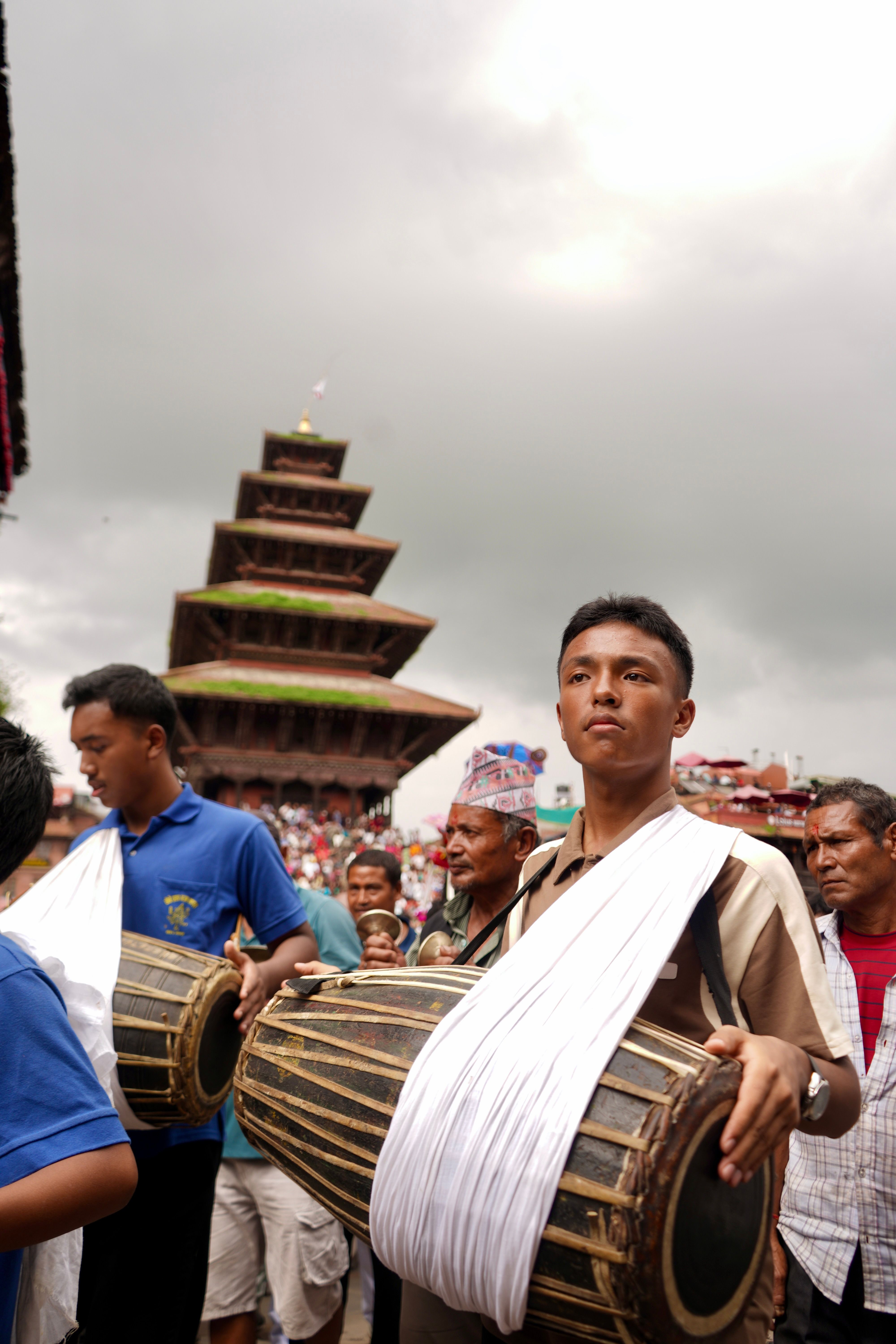 Nepali drummers at a vibrant cultural festival in Bhaktapur, highlighting local traditions and heritage.