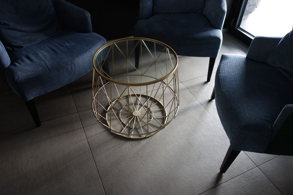 5 Essential Considerations for Choosing the Perfect Coffee Table for Your Living Room Wood coffee table in a cozy living room with warm wood tones and natural wood grain