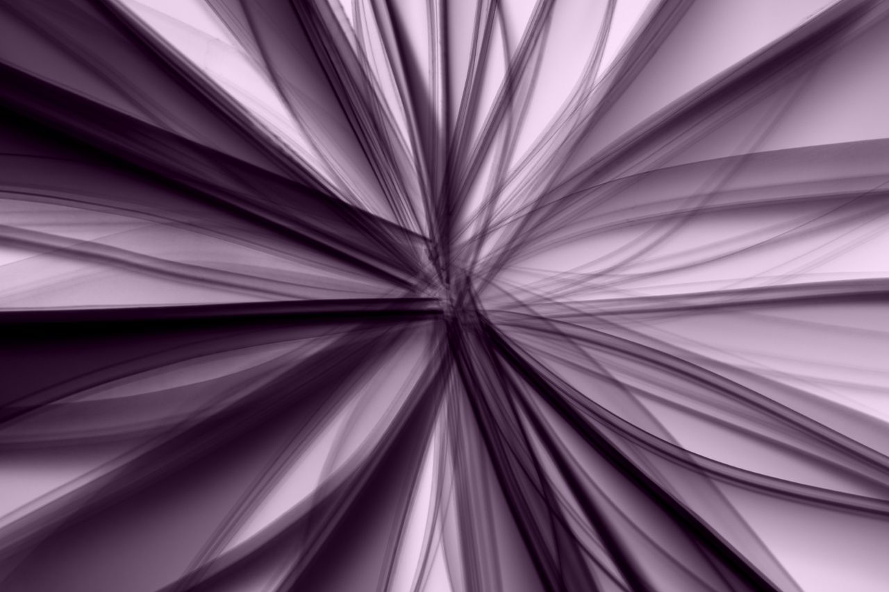 abstract image featuring dynamic purple lines radiating from a central