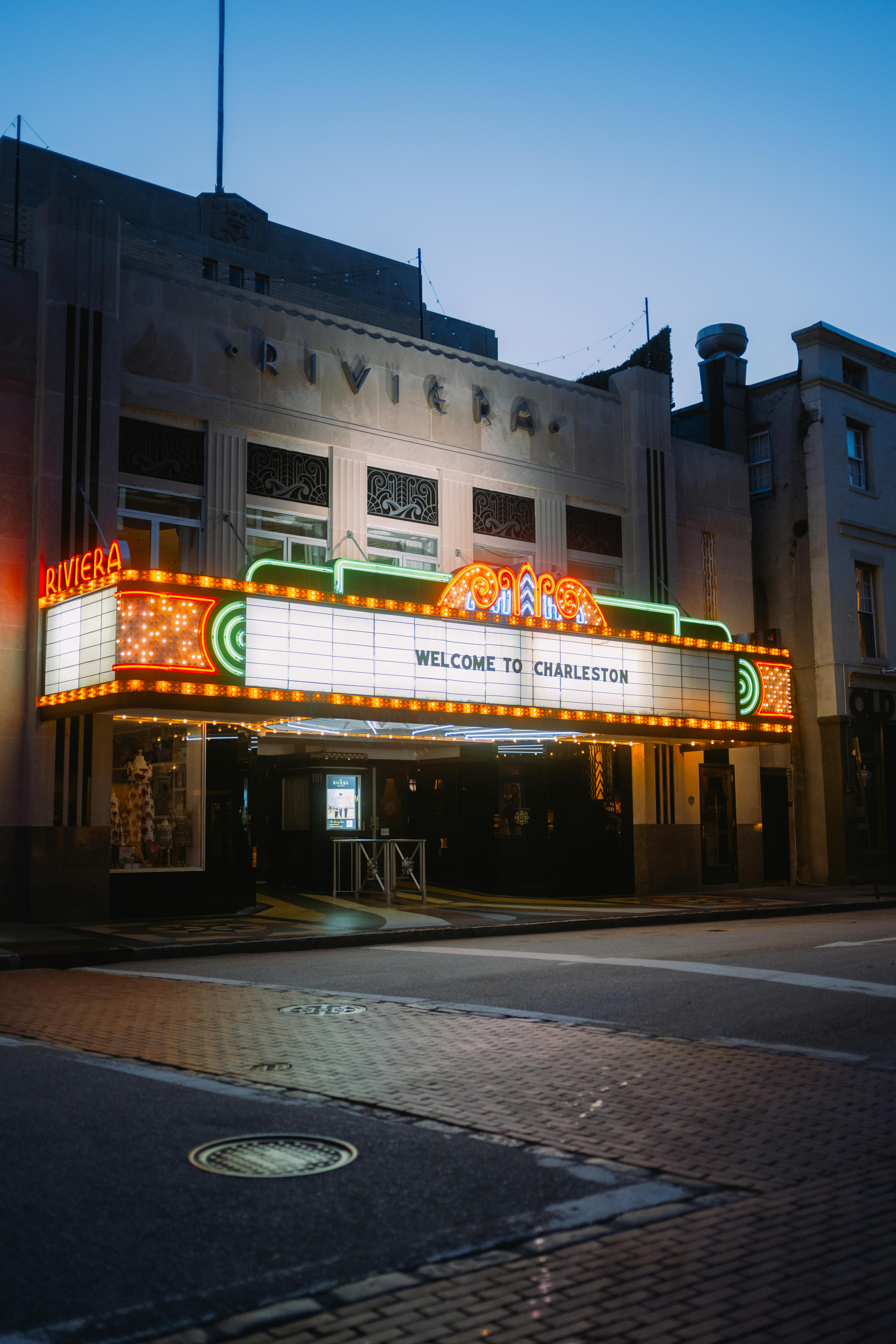 Free Vintage theater marquee illuminated at night in Charleston, South Carolina. Stock Photo