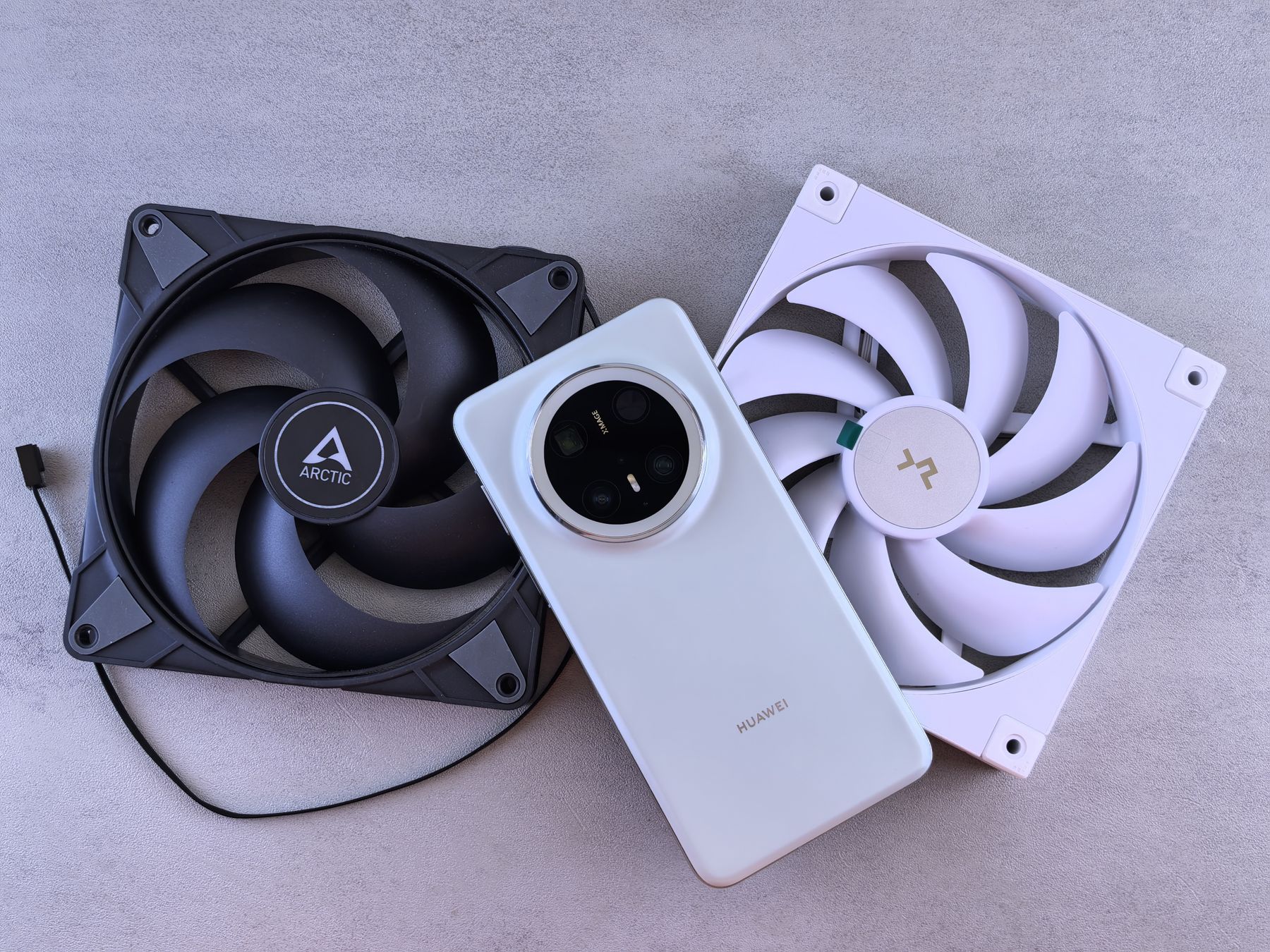 Smartphone beside cooling fans