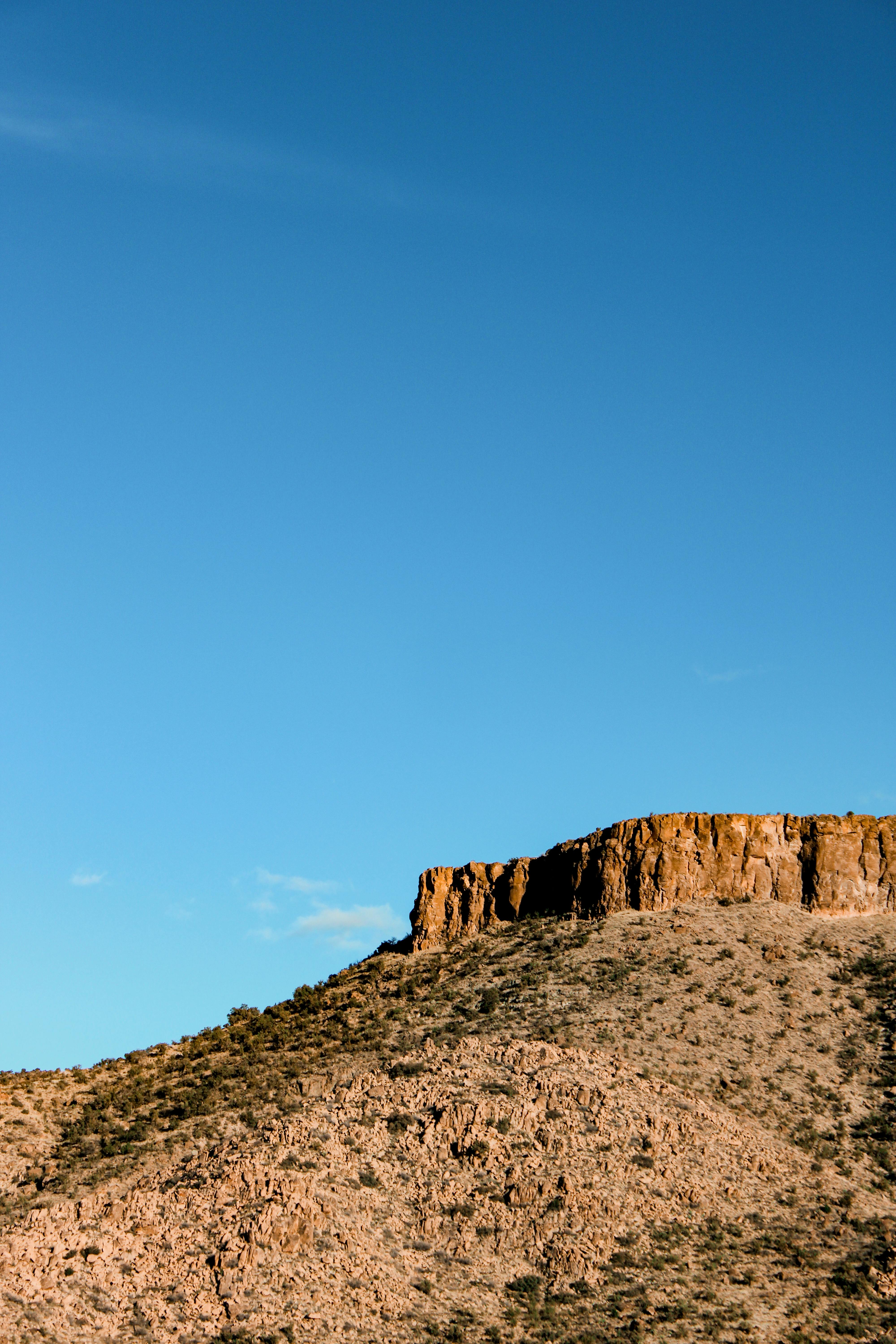 Stunning desert landscape in Arizona with clear blue sky and rocky formations.