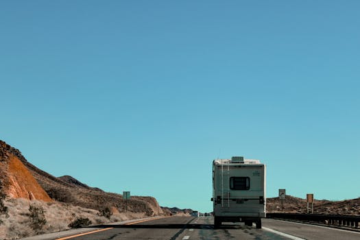 RV driving on a scenic Arizona highway, perfect for travel and adventure themes.