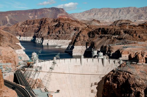 Free A breathtaking view of the iconic Hoover Dam and Colorado River, showcasing engineering excellence. Stock Photo