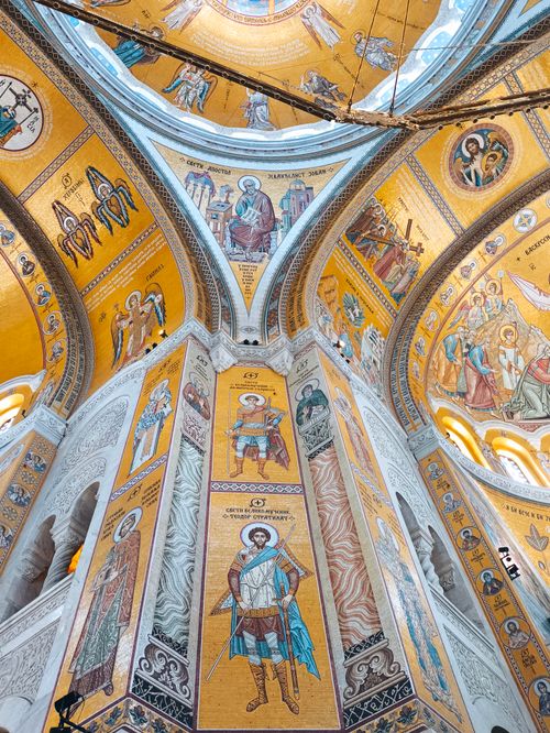 Free Spectacular view of intricate mosaic art inside a historic cathedral dome. Stock Photo