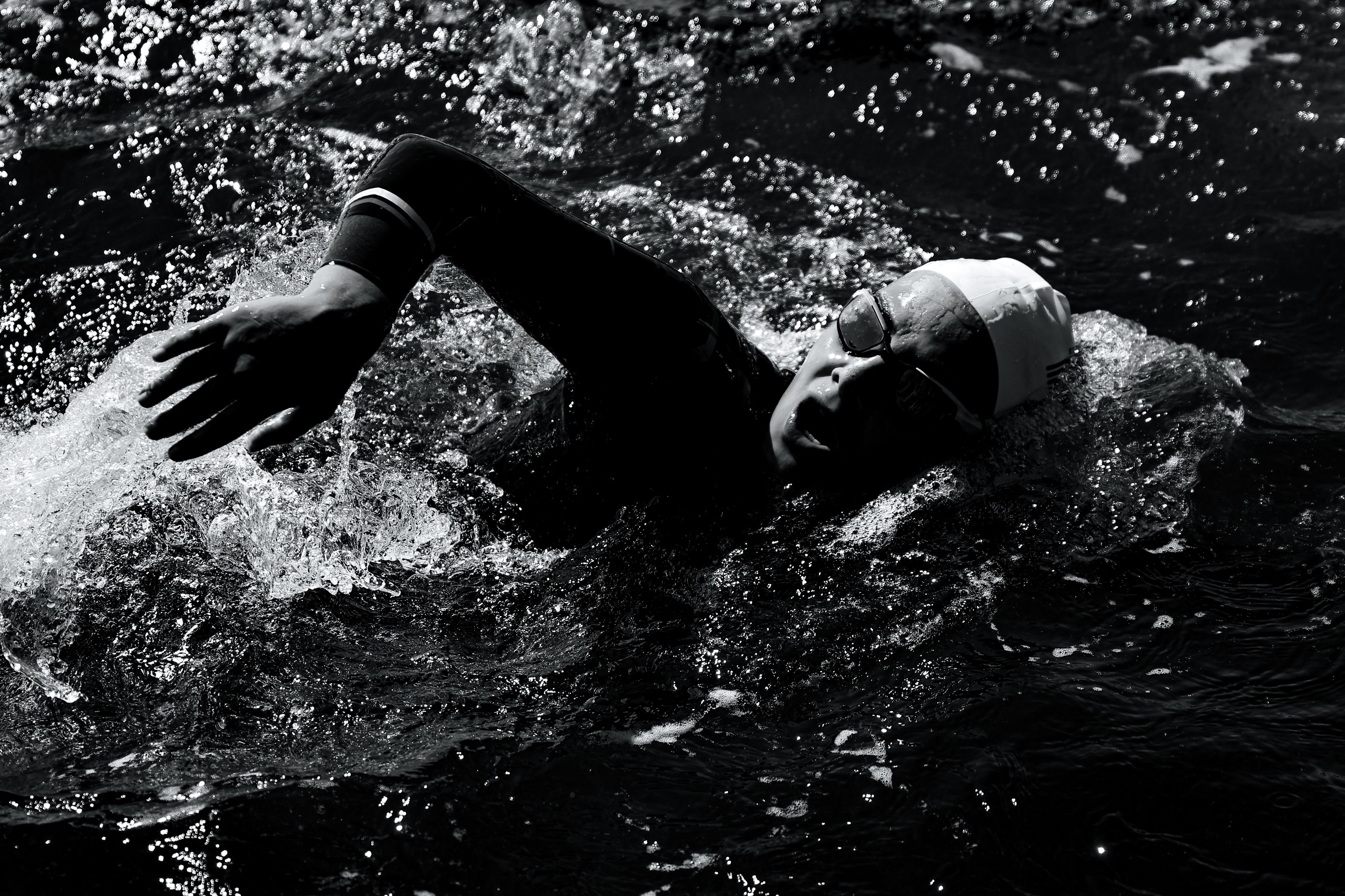 Dynamic Black and White Triathlon Swim in Portugal · Free Stock Photo