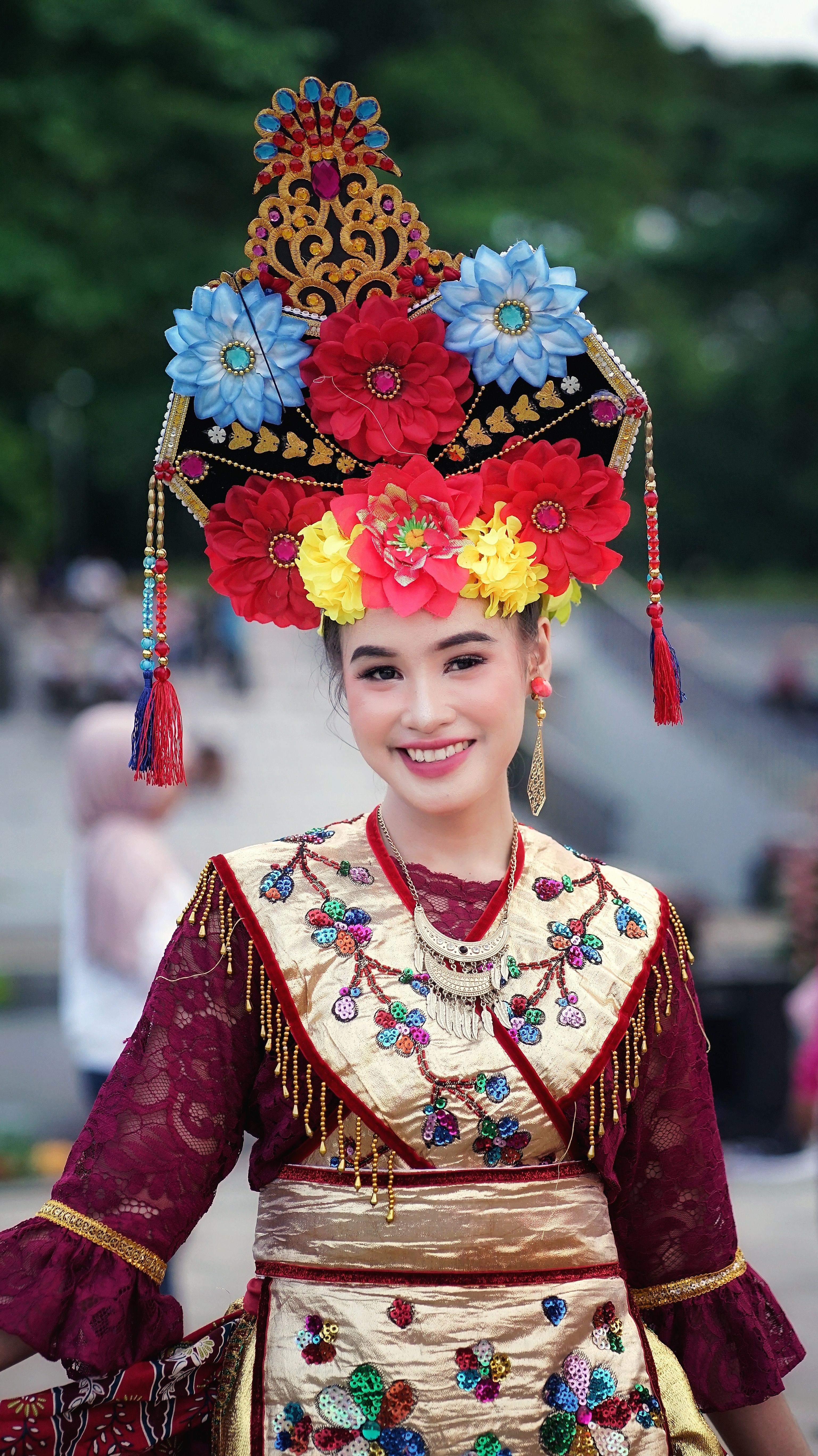 Colorful Traditional Costume Portrait Outdoors · Free Stock Photo