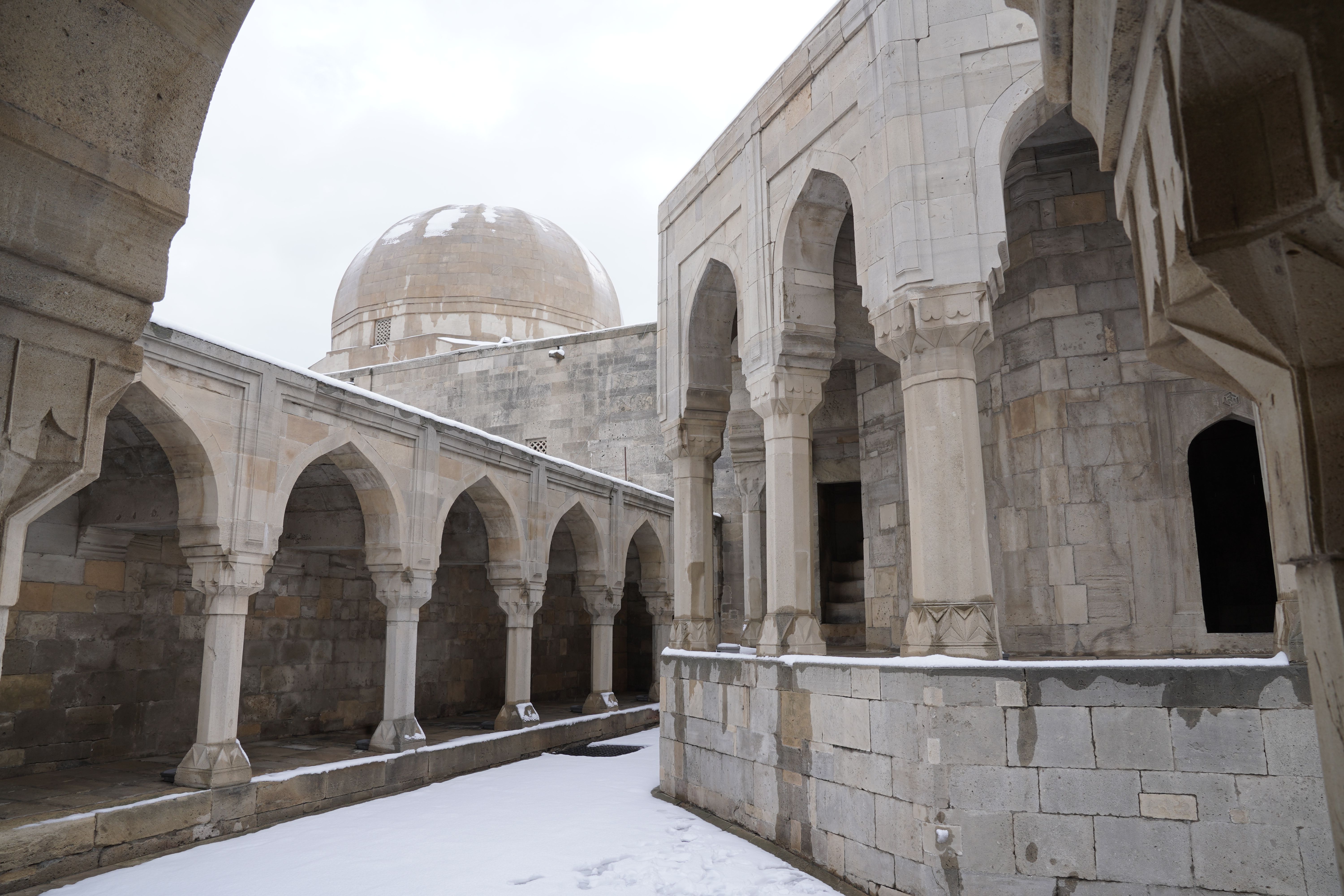 The Empire's Hospitality Network: How Iran's Caravanserais Kept the Silk Road Alive for a Thousand Years