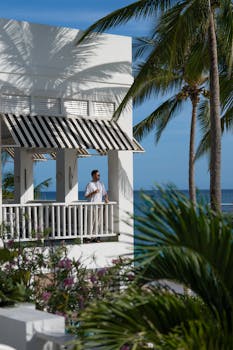 A person enjoys a tropical getaway at a luxurious resort in the Maldives.