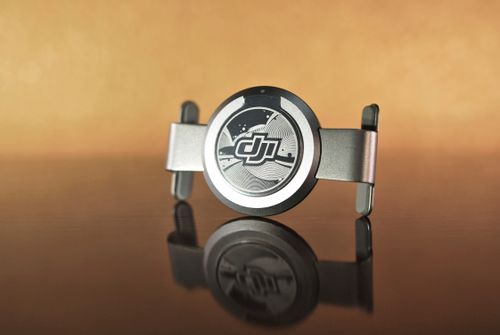 Free Elegant metal design object with a clean reflection on a glossy surface, showcasing modern artistic style. Stock Photo