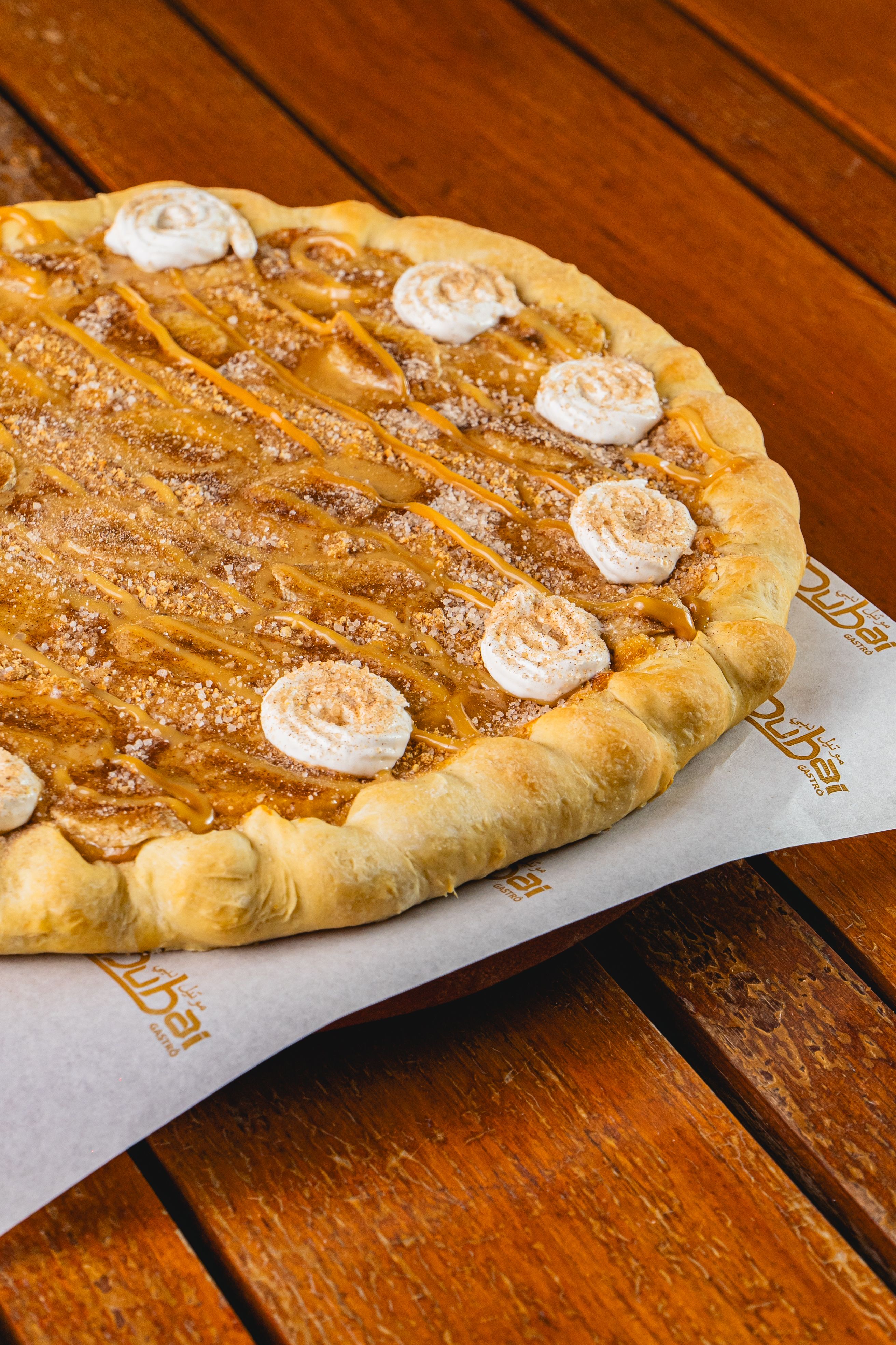 Satisfy your sweet cravings with this peanut butter dessert pizza topped with marshmallows.