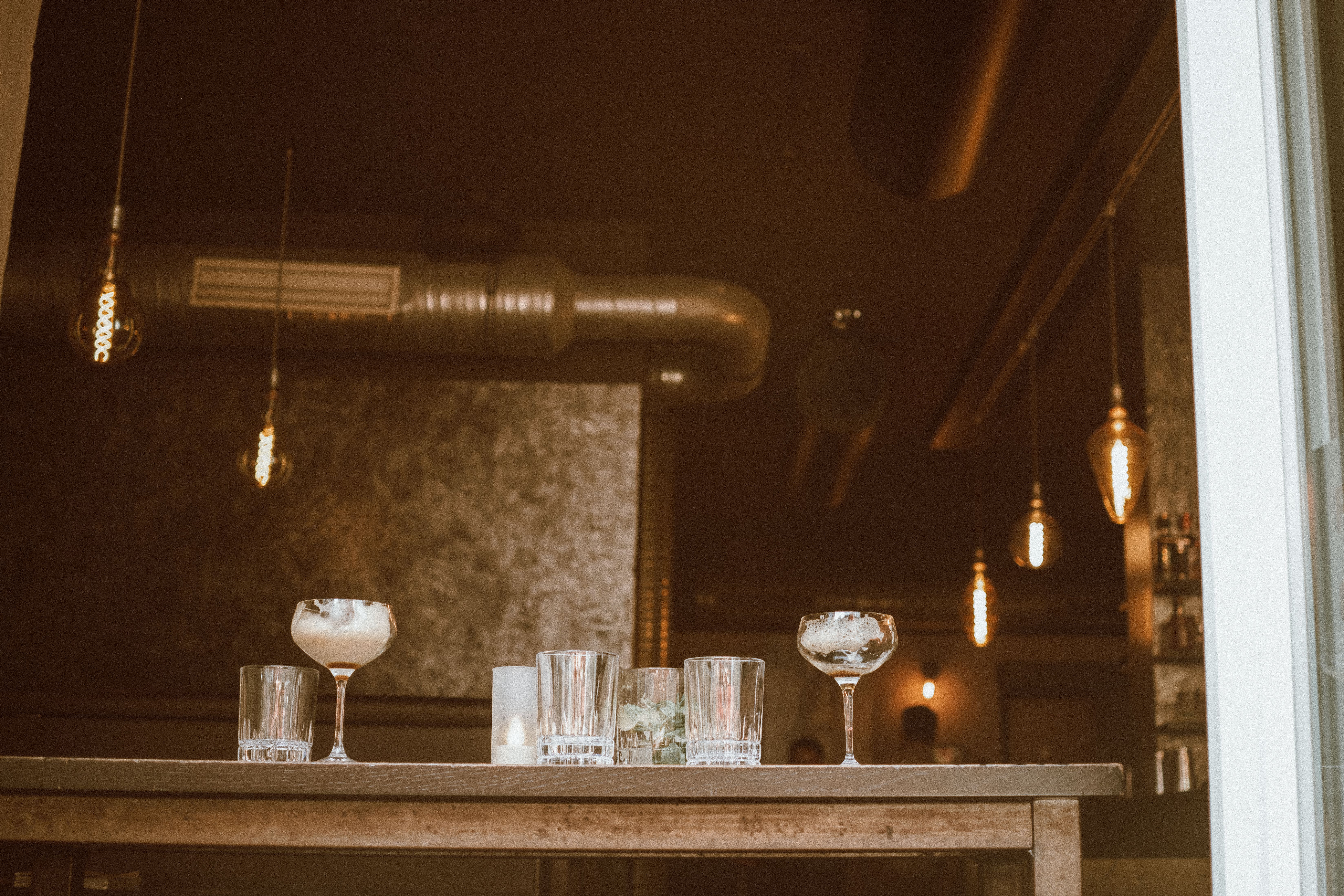 Industrial Chic Cocktail Bar Interior in Cologne · Free Stock Photo