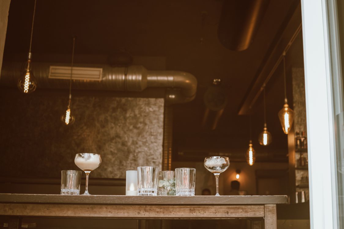 Industrial Chic Cocktail Bar Interior in Cologne · Free Stock Photo