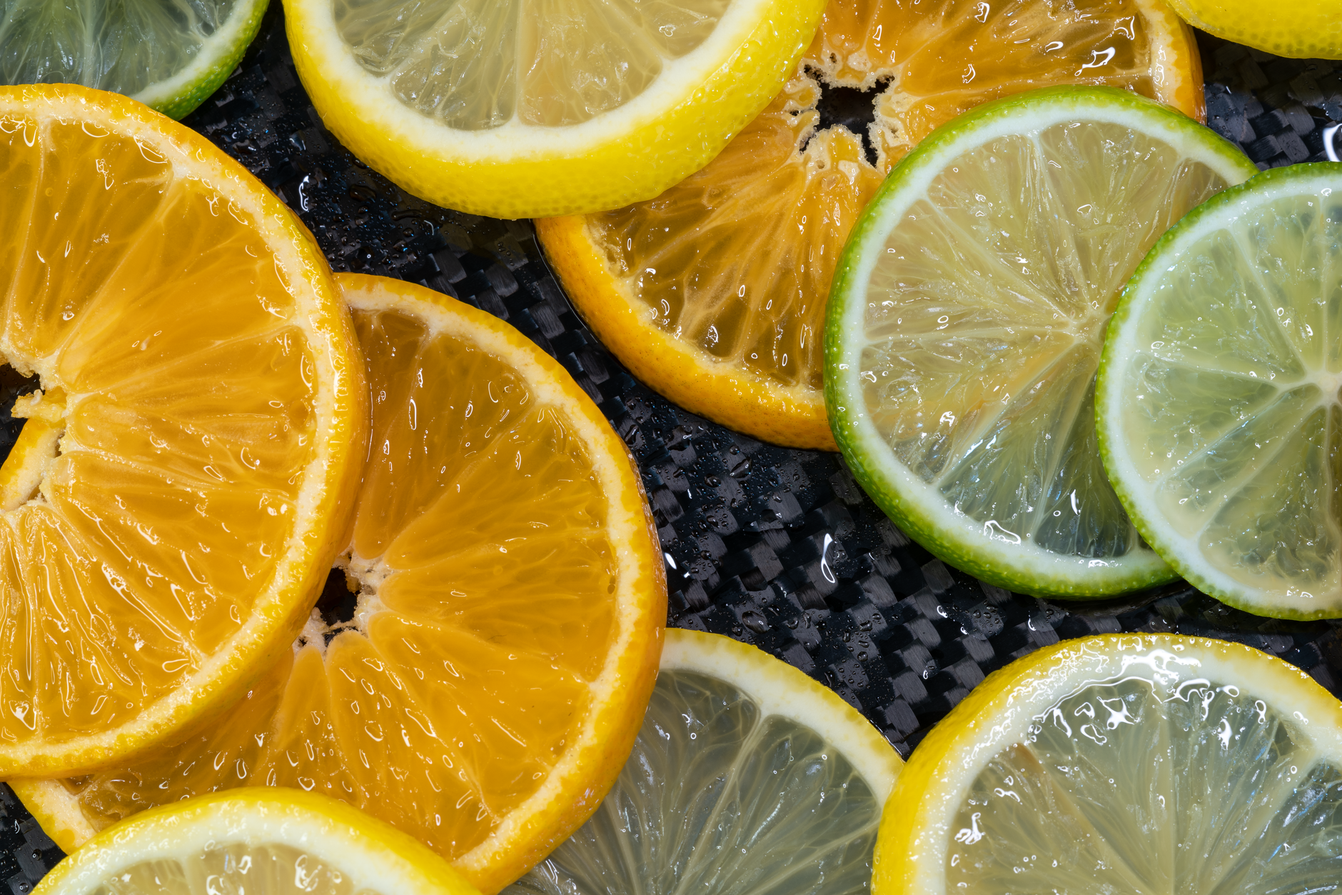 Close-up of fresh citrus slices showcasing vibrant colors and textures.