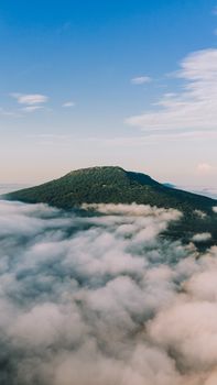 Stunning aerial shot of a mountain enveloped in clouds in Chattanooga, Tennessee.
