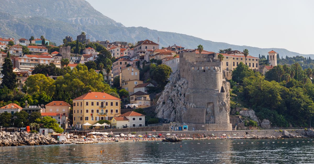 Explore the stunning coastal view of Herceg Novi, Montenegro with the historic Kanli Kula tower by t