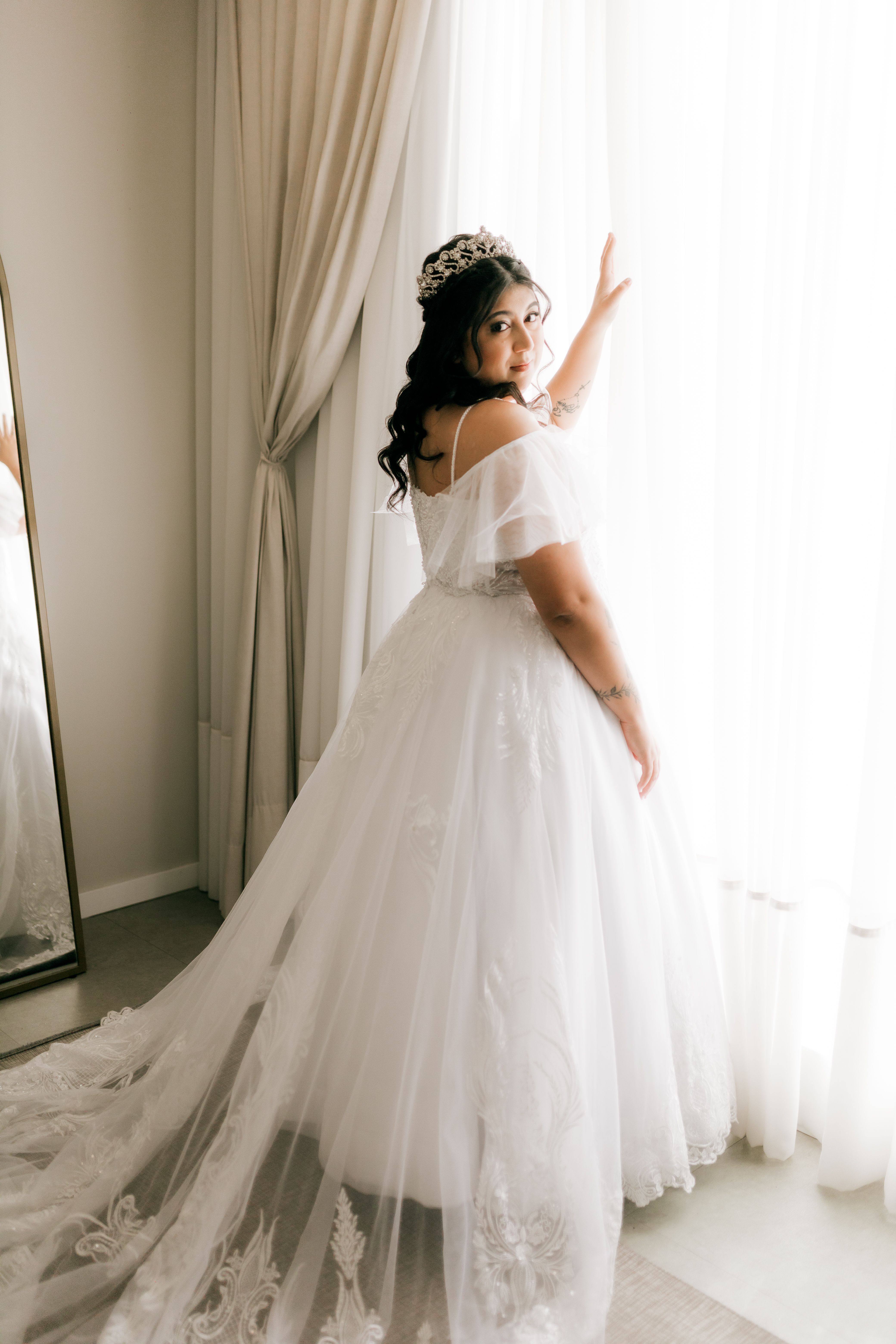 Woman In White Wedding Dress Standing Near The Window · Free Stock Photo