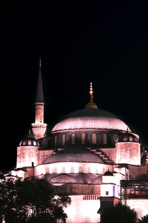 Free Stunning nighttime view of the illuminated Hagia Sophia Mosque in Istanbul, showcasing Islamic architecture. Stock Photo