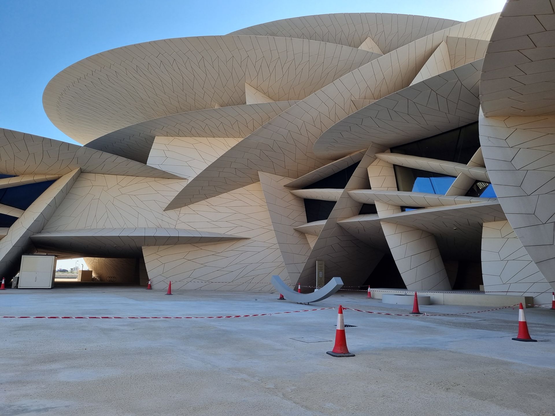 Futuristic architecture of the National Museum of Qatar in Doha, showcasing innovative design.