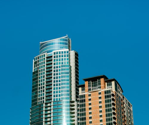 Free Stunning view of a modern skyscraper against a clear blue sky in Austin, Texas. Stock Photo