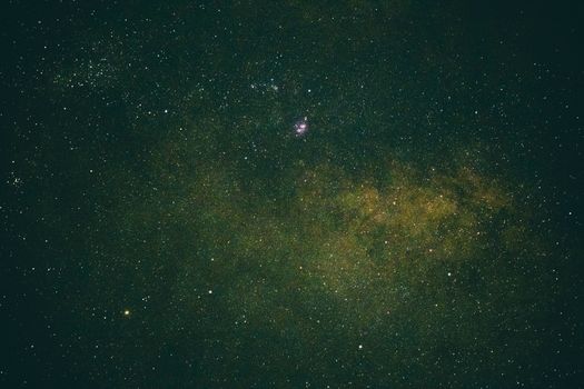 A breathtaking view of a star-filled night sky showcasing a dense galaxy cluster.