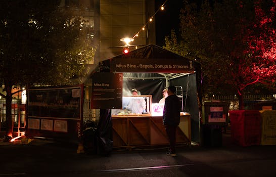 Street food stall during the Vivid Sydney Festival at night, capturing urban nightlife.