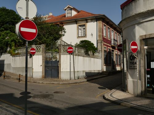 Free Urban street scene featuring several no entry signs on a sunny day. Stock Photo