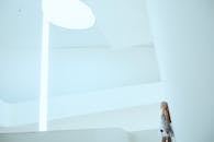 Minimalist Interior with Woman Standing