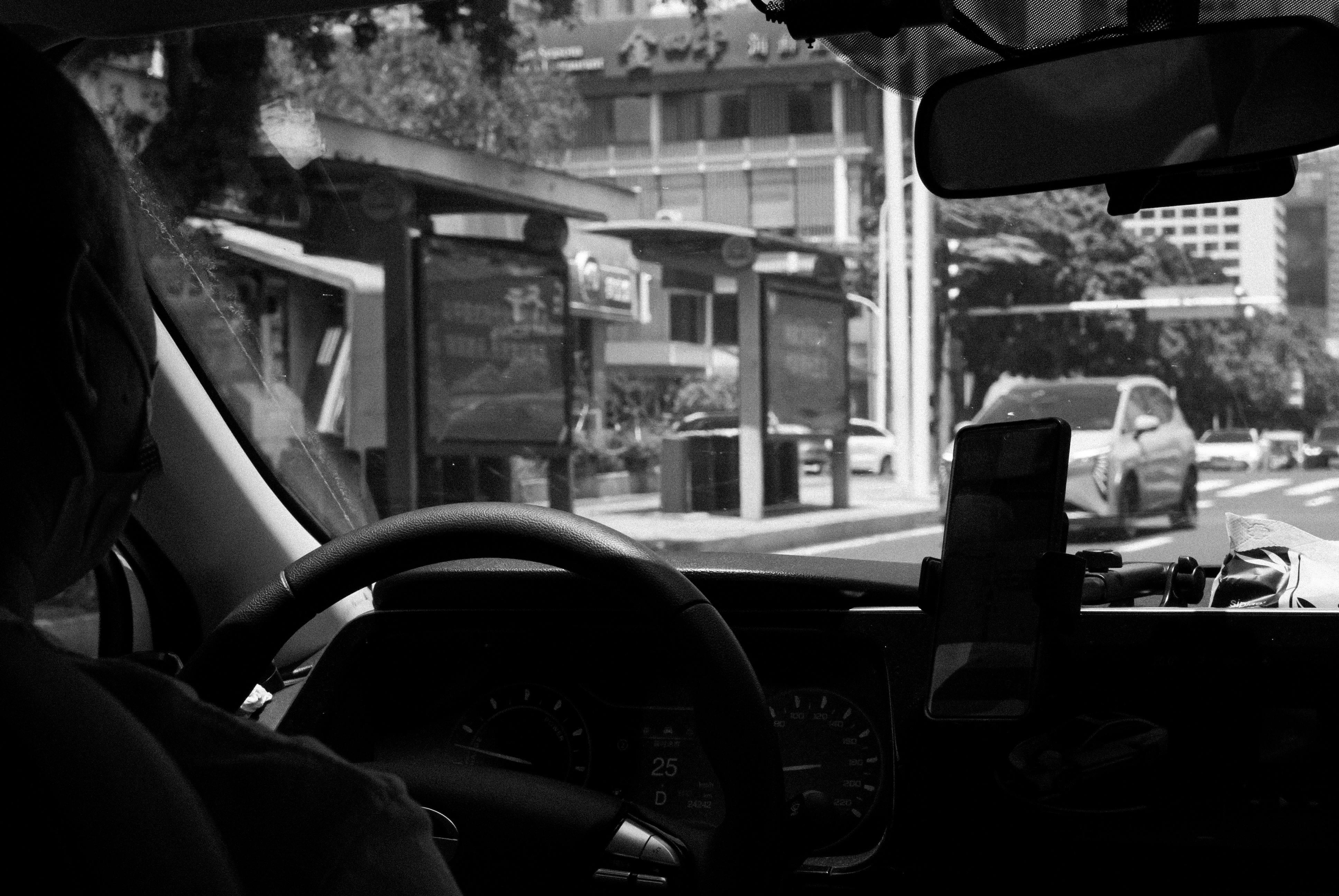 Uber Technologies, Inc. - Uber Expands into Travel with Hotel Bookings and New In-App Features — Photo by Da Na on Pexels