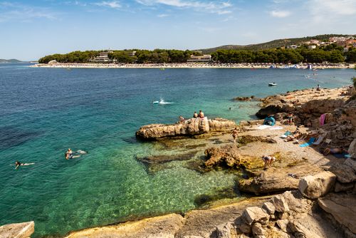 Free Stunning coastal landscape in Primošten, Croatia, showing clear waters and rocky shores. Stock Photo