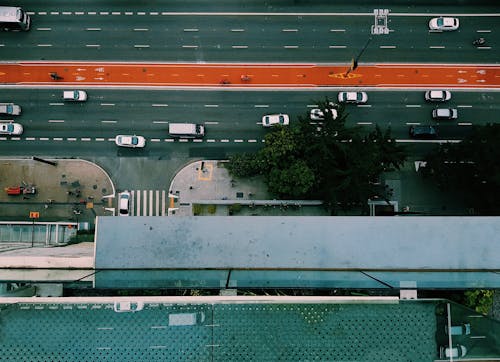 Top View Photo of Vehicles Driving on Road
