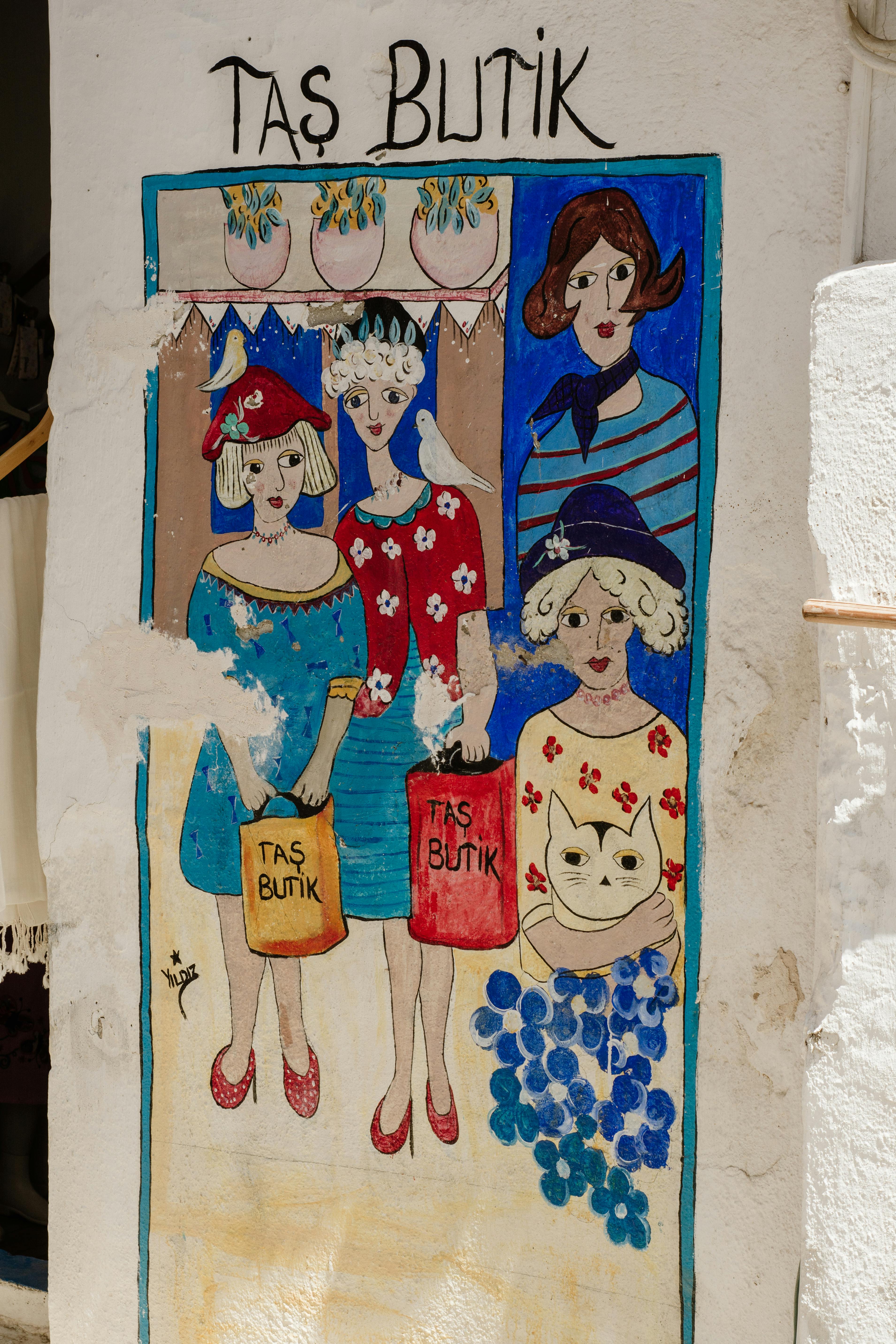 Colourful street art and independent boutique shopfronts along Haji Lane in Kampong Glam Singapore